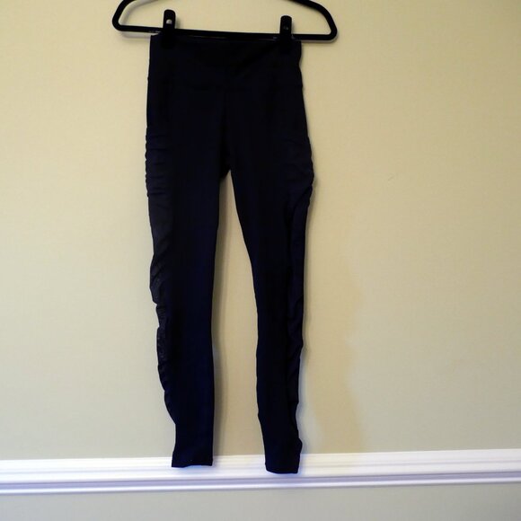 High-Waisted PowerHold® made by Fabletics black Legging with mesh cutouts - Picture 4 of 4